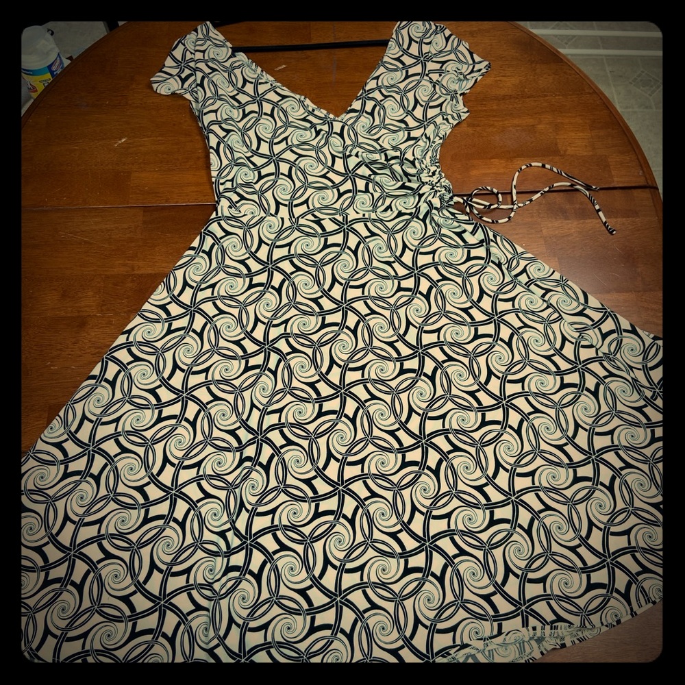 Dress barn, Creamy white dress w/Black swirls.